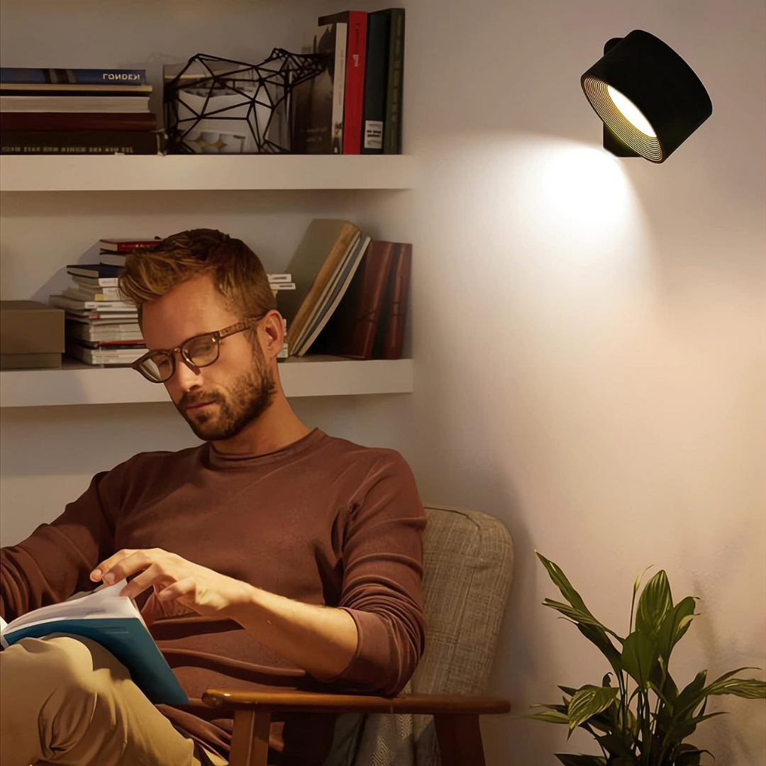 Portable LED wall light, rechargeable & wireless. Features 360° rotation and intuitive touch control.