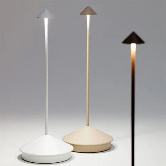 Contemporary wireless LED table lamp, dimmable for adjustable ambiance. Great for modern home decor and accent lighting.