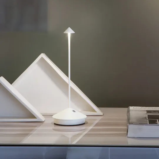 Stylish wireless LED table lamp offering dimmable, portable lighting. Enhance your indoor or outdoor space with ease.
