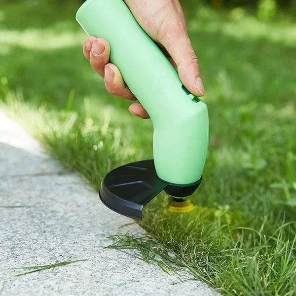 Wireless mini grass trimmer for precise lawn and garden edging. Lightweight, portable battery-powered garden tool.