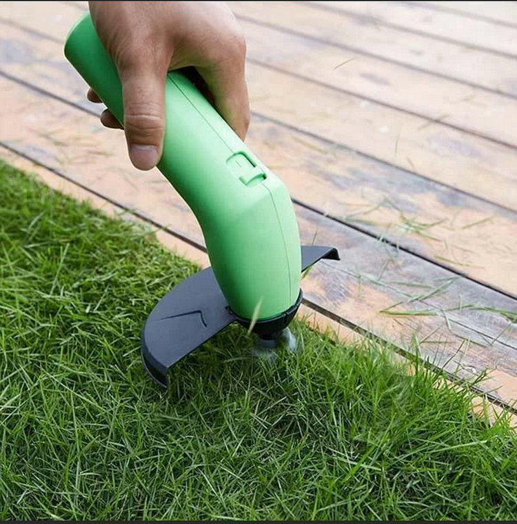 Lightweight, portable mini grass trimmer for easy lawn edging and garden detail work. Cordless battery power.