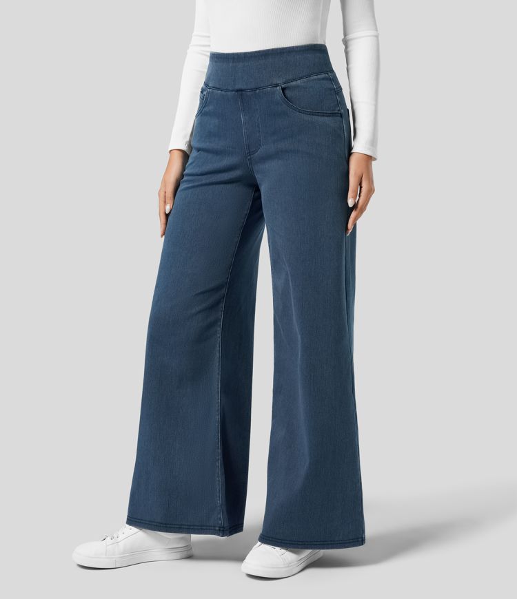 Woman in high-waisted wide-leg stretch trousers, comfortable fit for spring & autumn casual fashion.