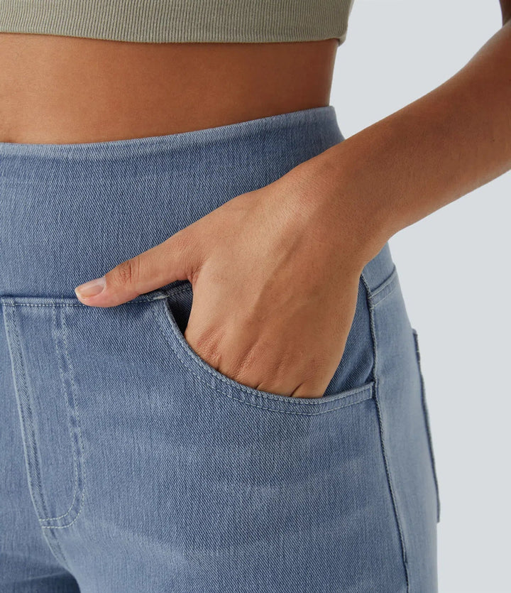 Relaxed woman modeling high-waisted wide-leg stretch trousers, ideal for comfortable spring & autumn casual wear.