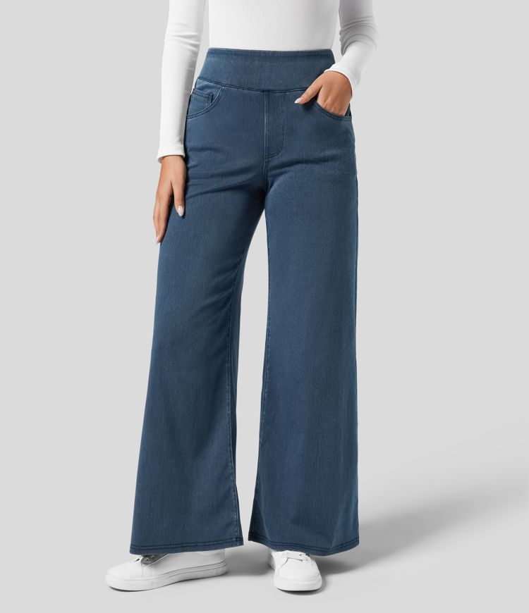 Comfortable stretch fit of women's high-waisted wide-leg trousers, designed with elastic waist for daily wear.