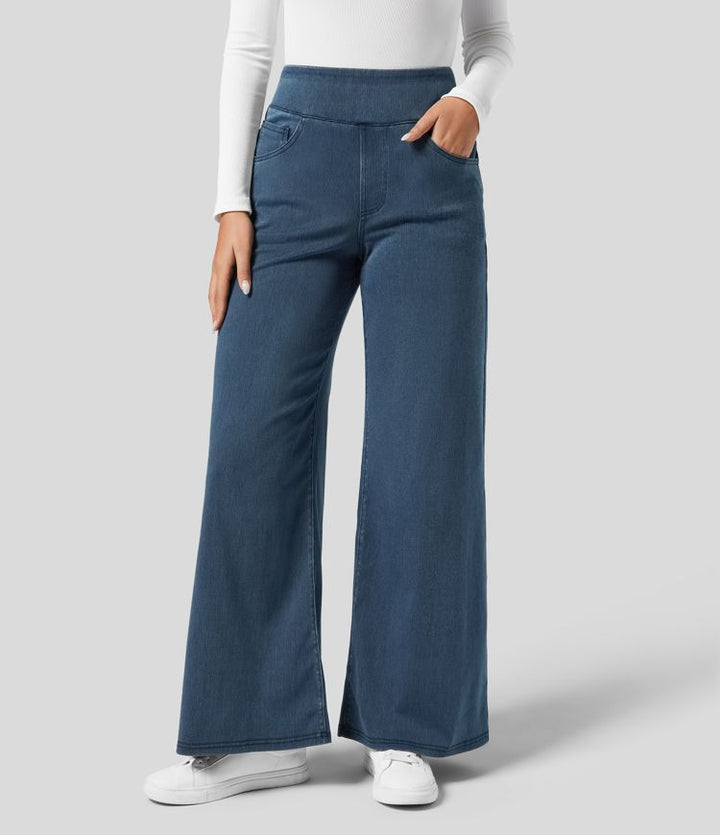Comfortable stretch fit of women's high-waisted wide-leg trousers, designed with elastic waist for daily wear.