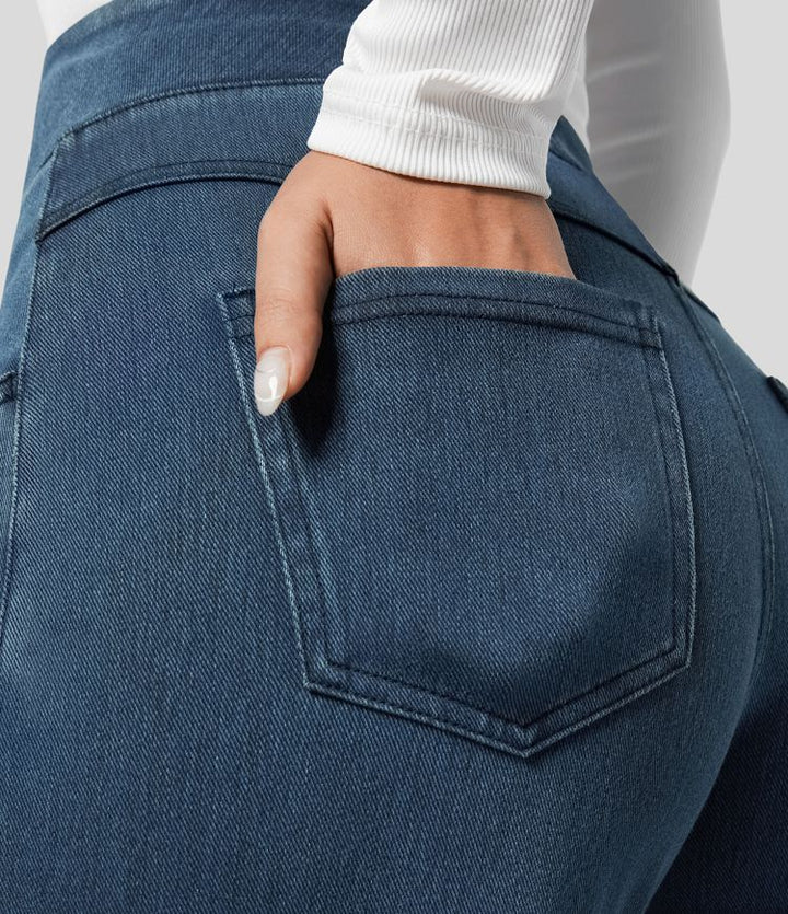 Close-up of stretchy fabric on women's high-waisted wide-leg trousers, highlighting comfort and elastic waist.