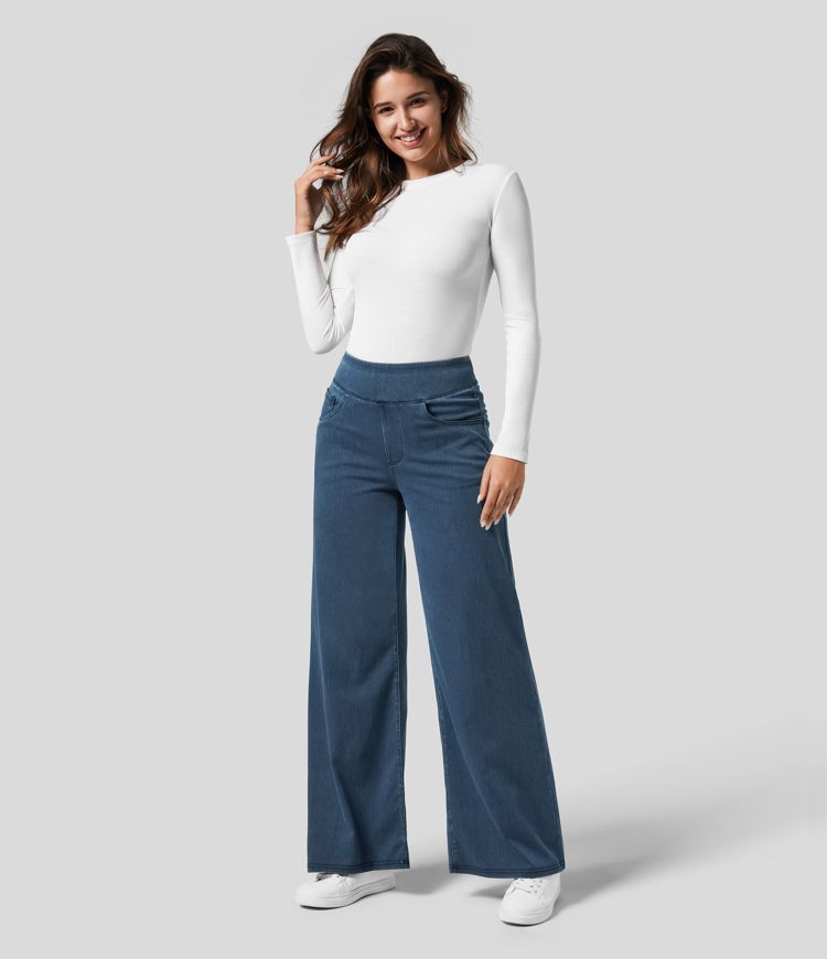 Casual spring outfit: woman wearing high-waisted wide-leg stretch trousers with a relaxed top, comfy & stylish.