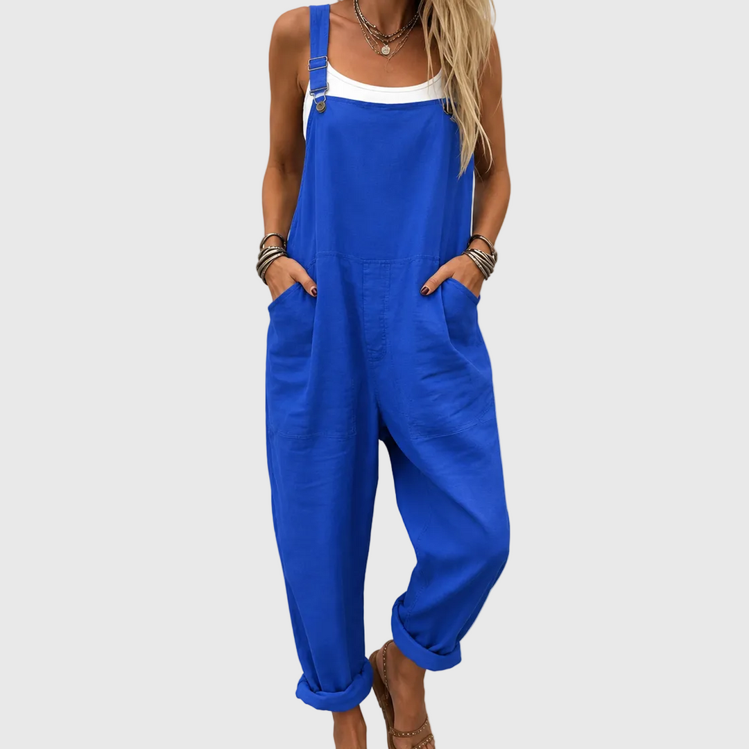 Woman wearing a soft blue casual jumpsuit with a relaxed fit, perfect for comfortable spring and summer everyday wear.
