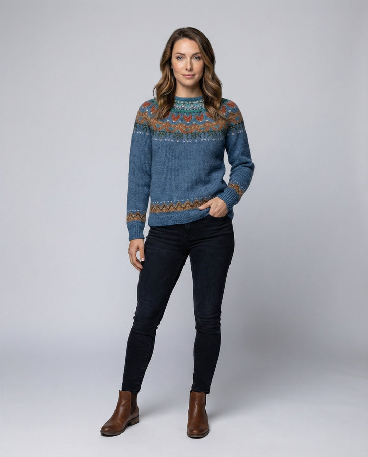 Woman wearing a vintage Icelandic knit sweater with traditional patterns