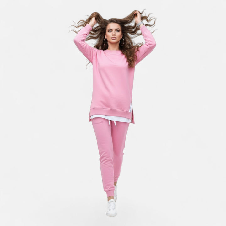Elegant comfort in a women's two-piece set: slit sweatshirt & slim pants. Stylish loungewear for versatile fashion.