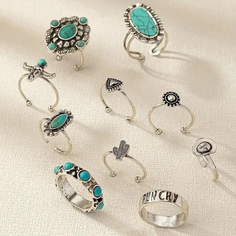 Turquoise western ring set with bull skull and cactus designs, perfect boho jewelry for women.