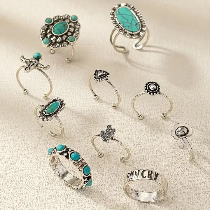 Turquoise western ring set with bull skull and cactus designs, perfect boho jewelry for women.