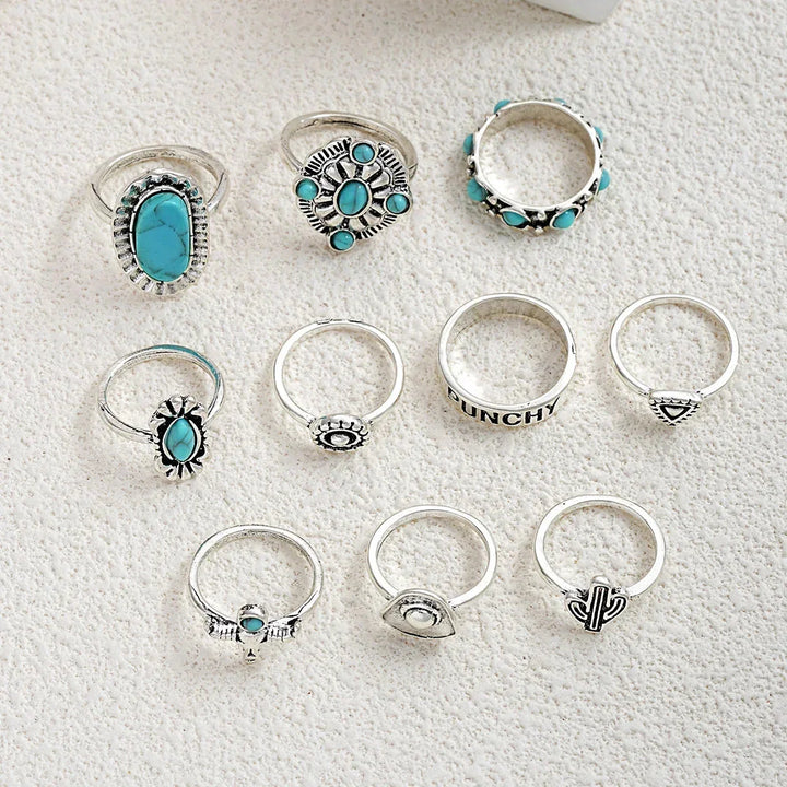 Diverse 10-piece women's turquoise western ring collection, ideal for stacking and unique boho looks.