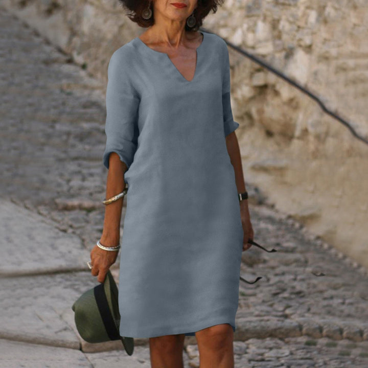 Women's 3/4 sleeve V-neck midi shift dress, comfortable & stylish for everyday fashion.
