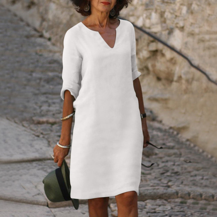 Effortless everyday style: Women's 3/4 sleeve shift midi dress, casual & comfortable.