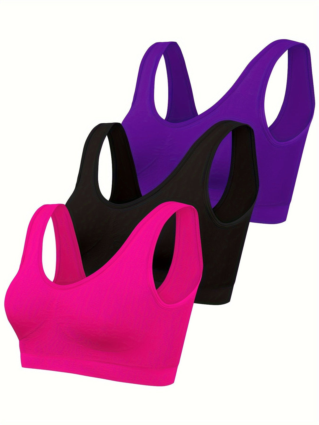 Modern women's seamless 3-piece activewear set featuring a supportive sports bra & stylish tank tops for workouts.