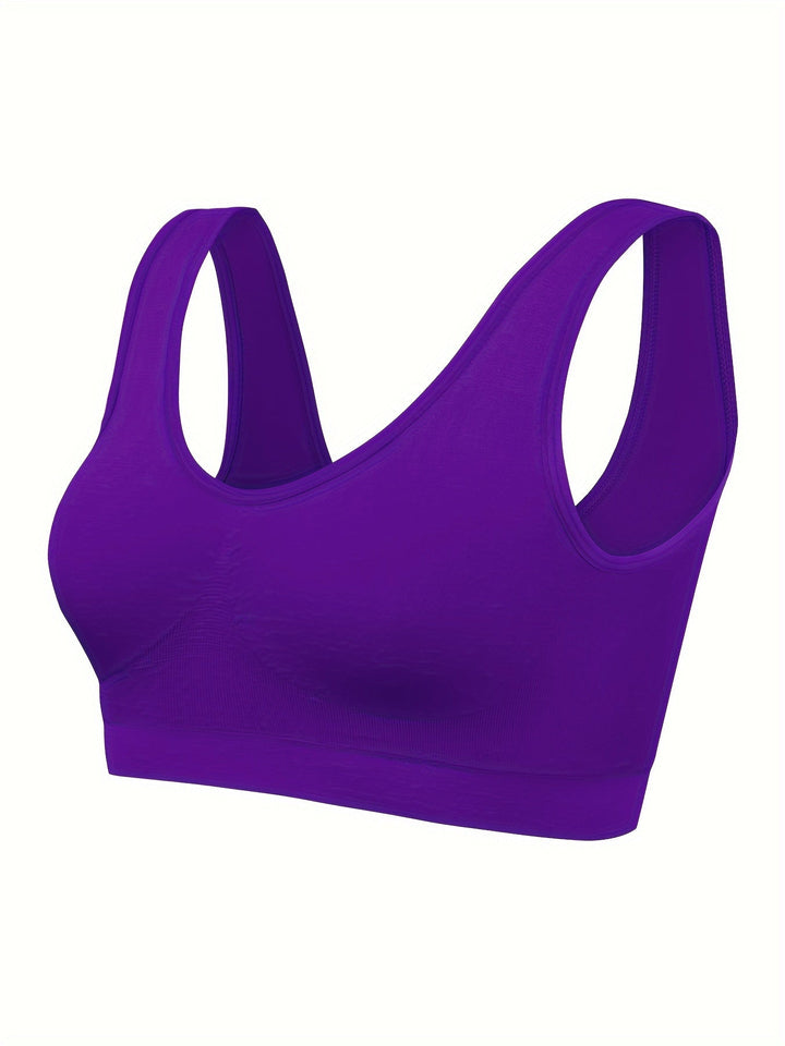 Sleek women's 3-piece seamless activewear set with a supportive sports bra & two comfortable tank tops.