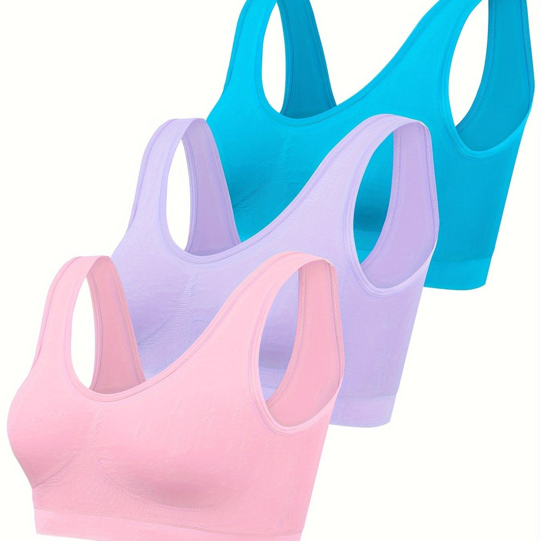 Women's seamless workout set featuring a supportive sports bra & breathable tank tops for active performance.