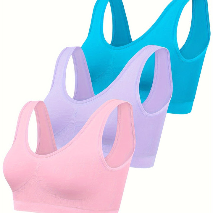 Women's seamless workout set featuring a supportive sports bra & breathable tank tops for active performance.