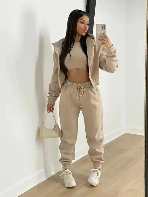 Premium women's loungewear set including cropped hoodie, bralette, & joggers.