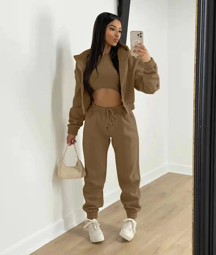 Comfy women's co-ord set with cropped hoodie, bralette, and athleisure joggers.