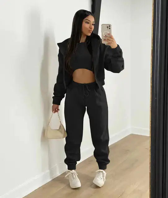 Women's relaxed elegance 3-piece: cropped hoodie, bralette, and joggers.