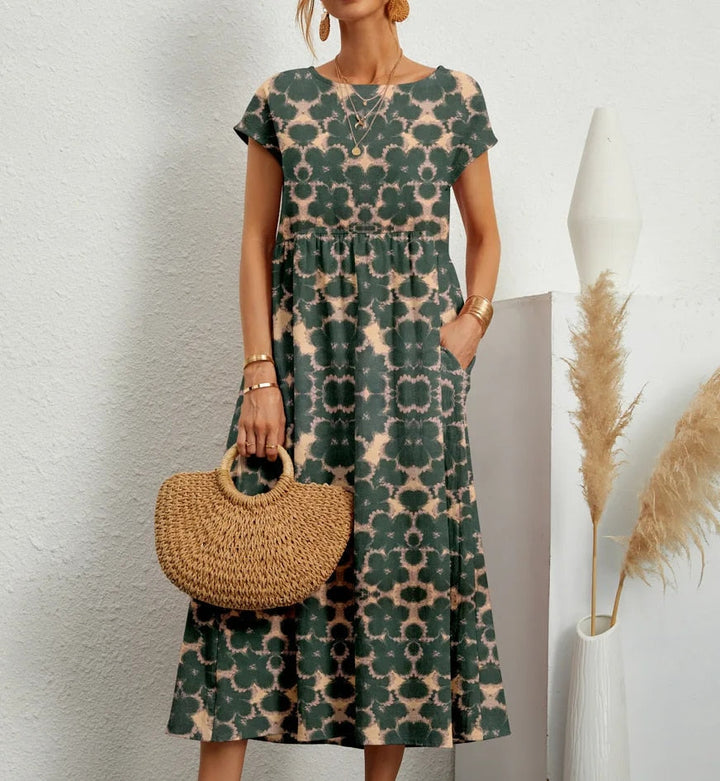 Chic women's A-line dress with a timeless floral print, suitable for various occasions.