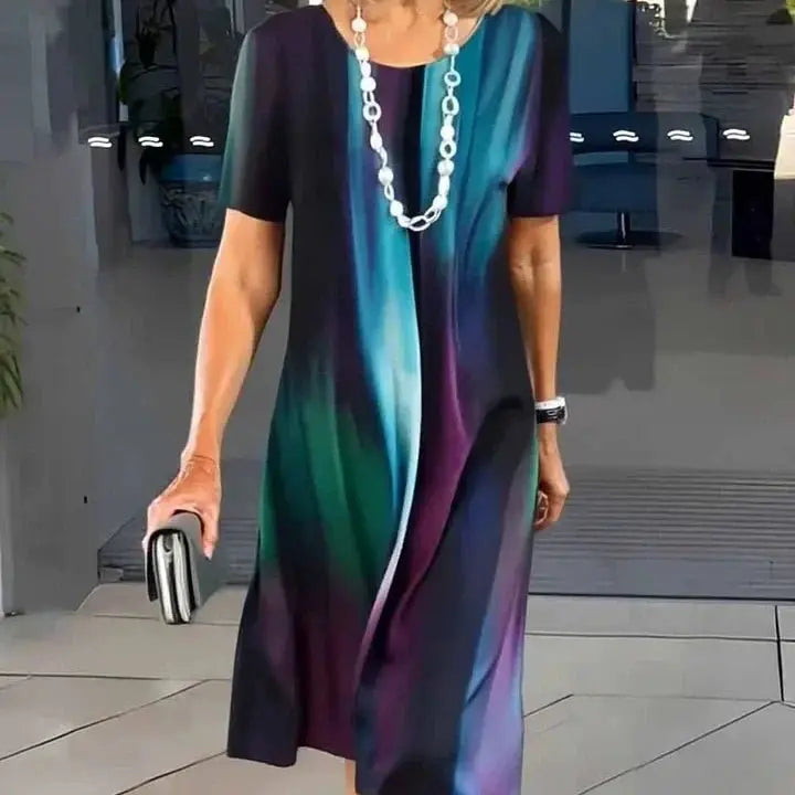 Chic A-Line midi dress for women, featuring a unique colorful splatter print and comfortable short sleeves.