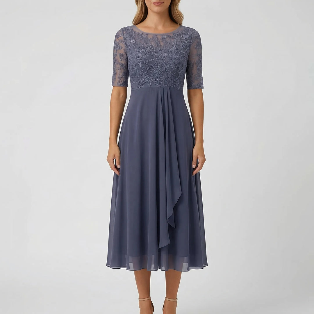 Elegant casual women's A-line midi dress with sophisticated embroidered bodice and relaxed fit. Summer ready.