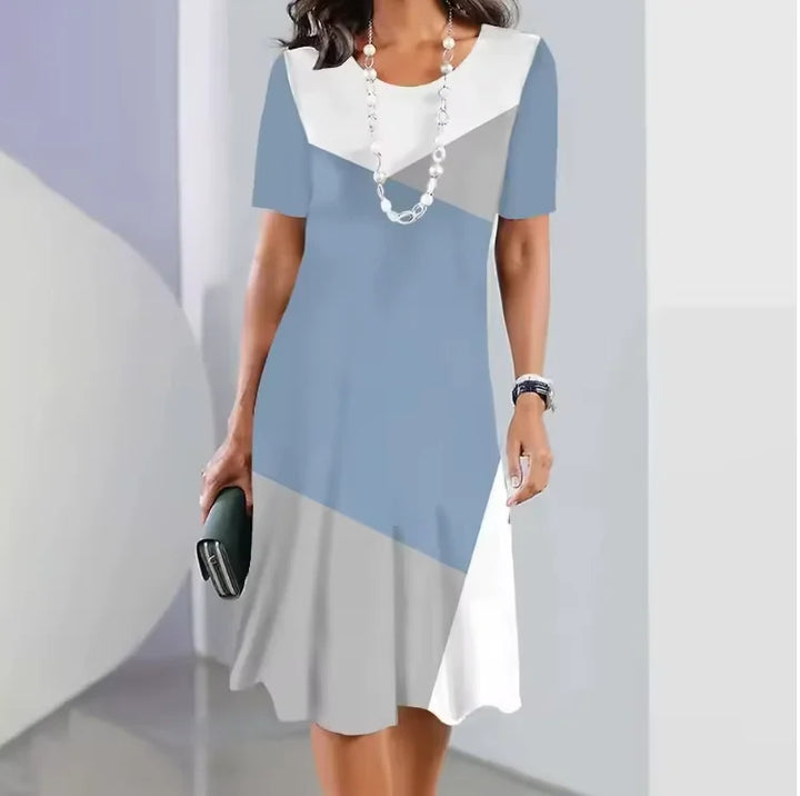 Stylish short sleeve round neck A-line midi dress for women, featuring a chic all-over print. Great for daytime.