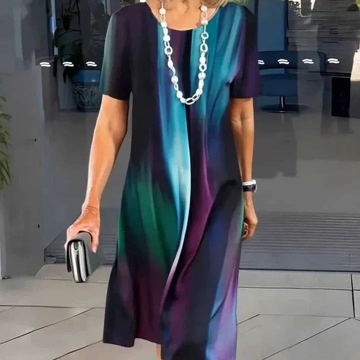 Comfortable & stylish women's print A-line midi dress, short sleeve, round neck, flattering for everyday wear.