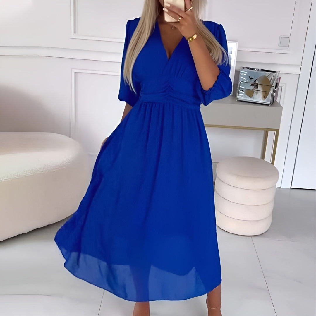 Elegant women's A-Line wrap midi dress featuring 3/4 sleeves and a V-neck, ideal for versatile summer & fall fashion.