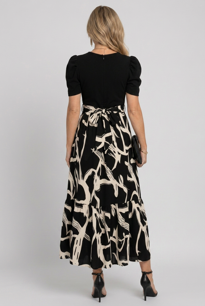 Stylish abstract floral print women's maxi dress with short sleeves, ideal for summer elegance.