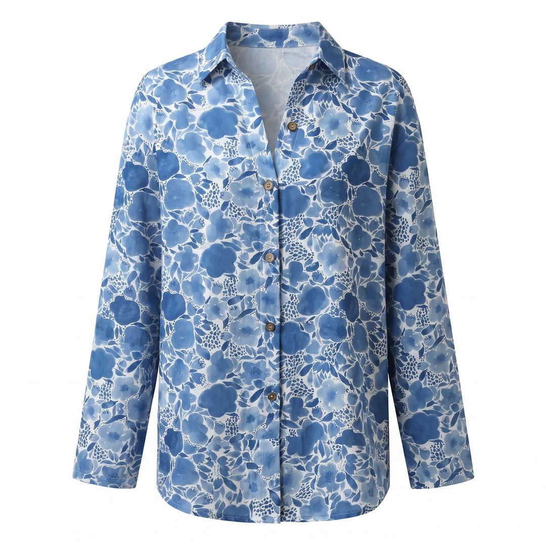 Stylish women's blouse featuring a vibrant abstract print and a chic split neck design.