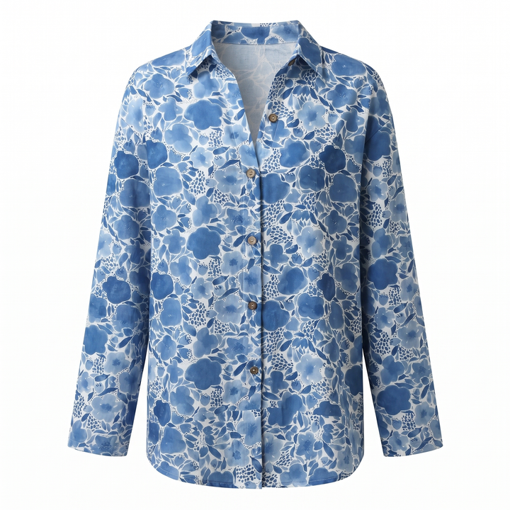 Stylish women's blouse featuring a vibrant abstract print and a chic split neck design.