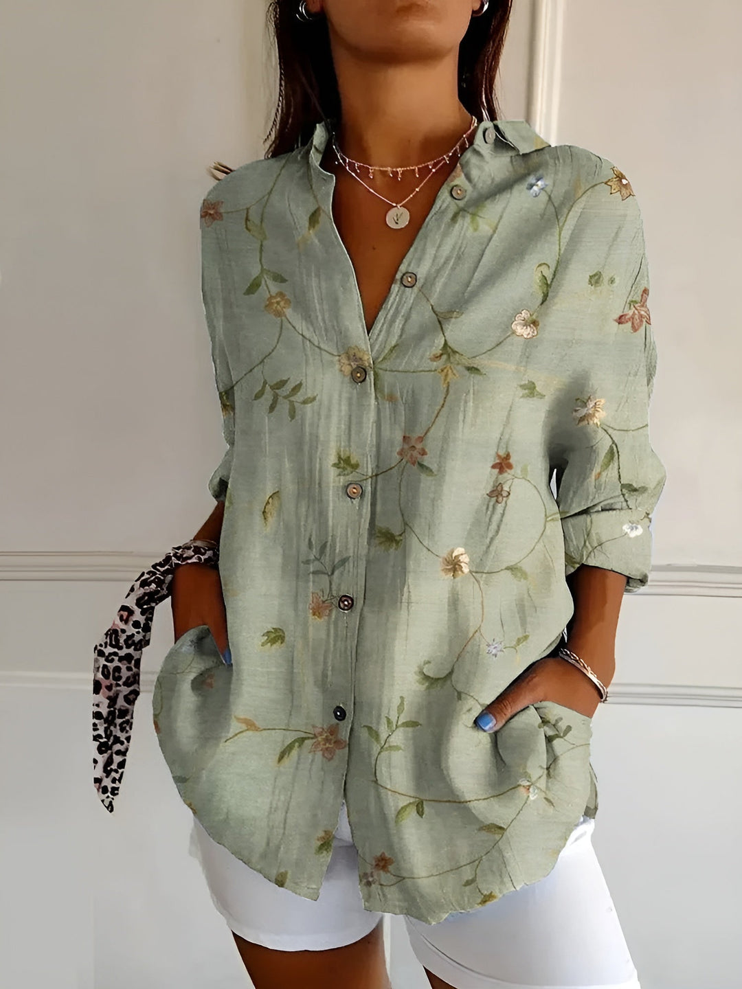 Casual long sleeve top for women, an abstract print blouse with a fashionable split neck.