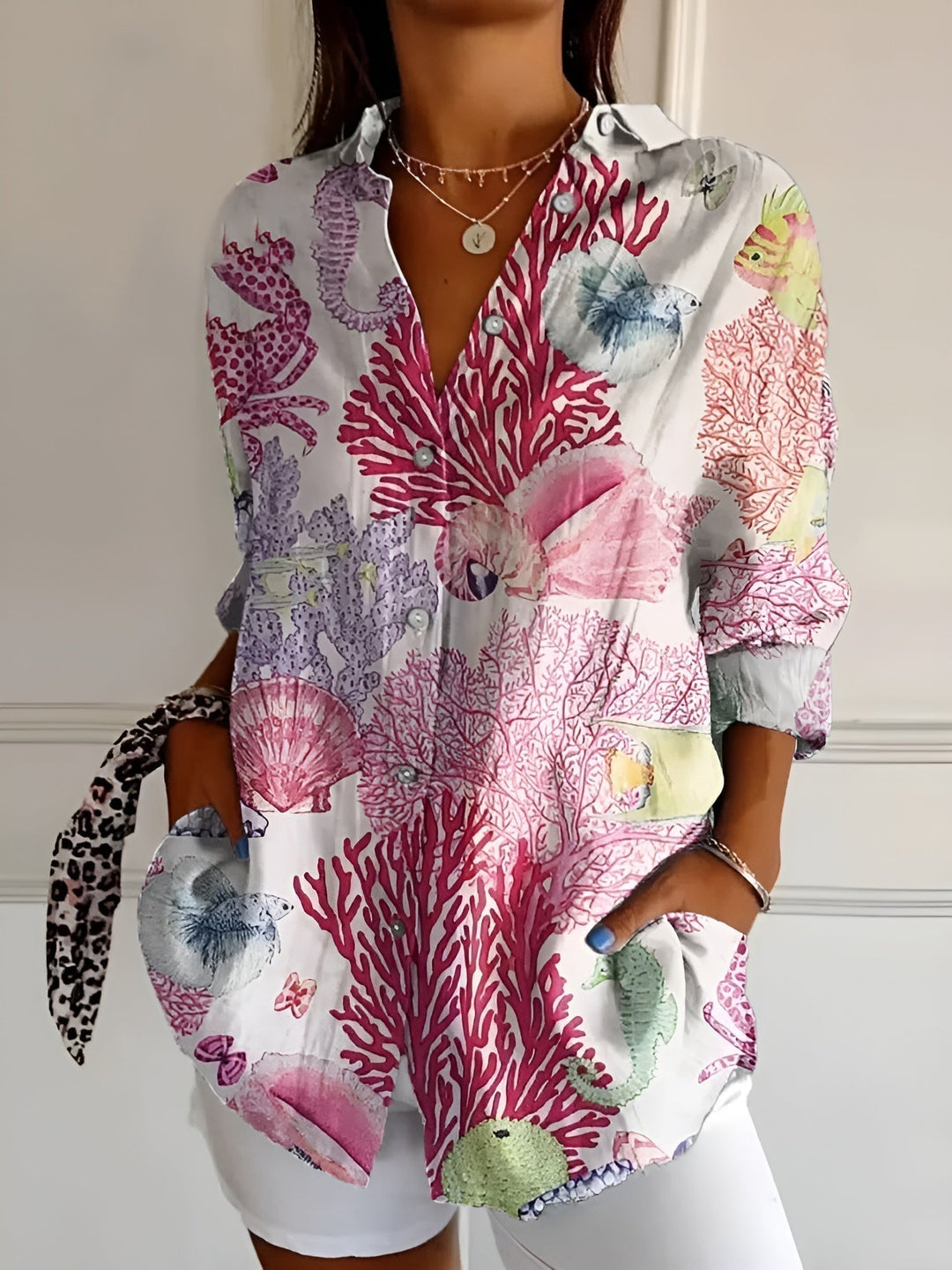 Everyday women's blouse, featuring a unique abstract print and a stylish split neck.