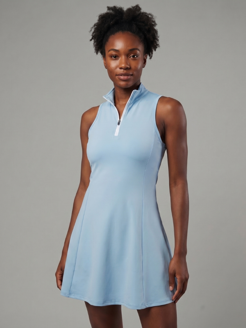 Women's Active Flow athletic tennis dress, sleeveless A-line mini with built-in shorts for performance & comfort.