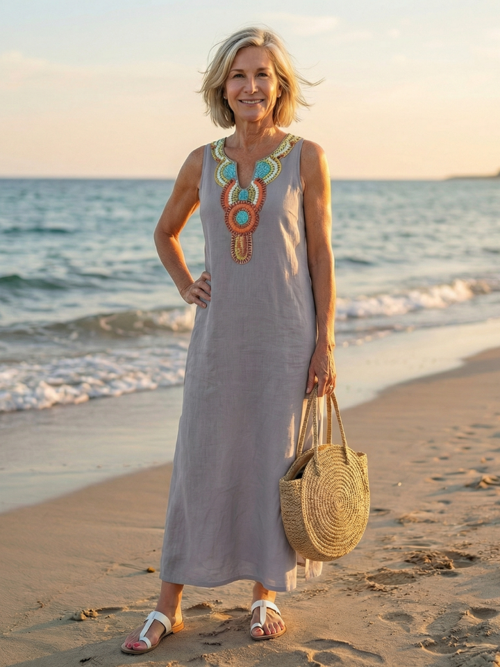 Women's sleeveless midi dress, airy flow fabric with embroidered neckline, great casual travel dress.