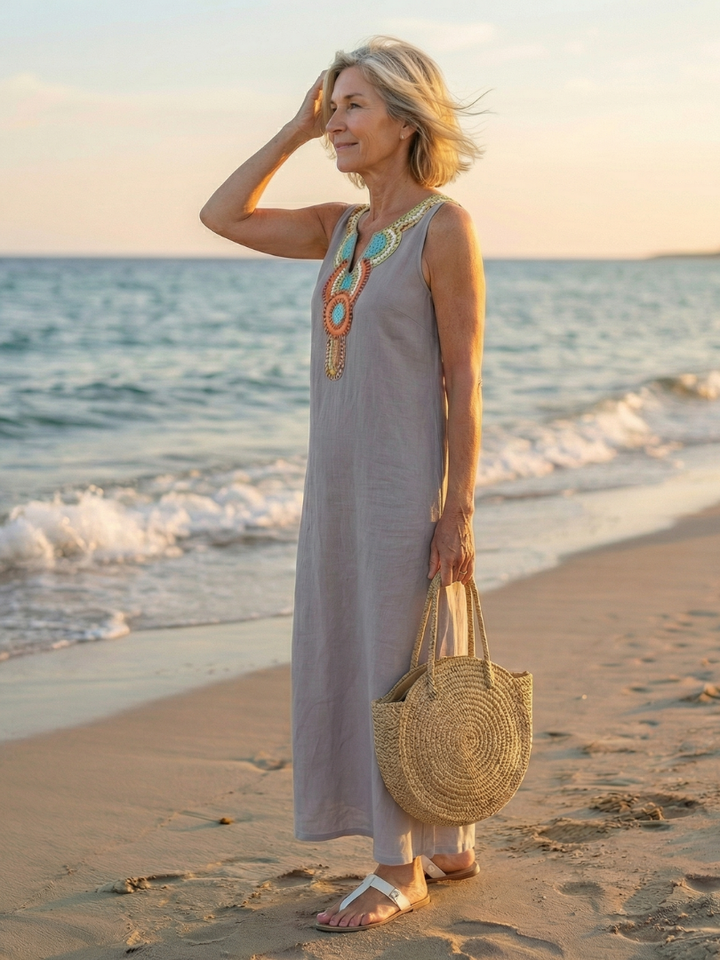 Sky blue women's sleeveless midi dress, airy flow design with relaxed fit, perfect summer casual dress.