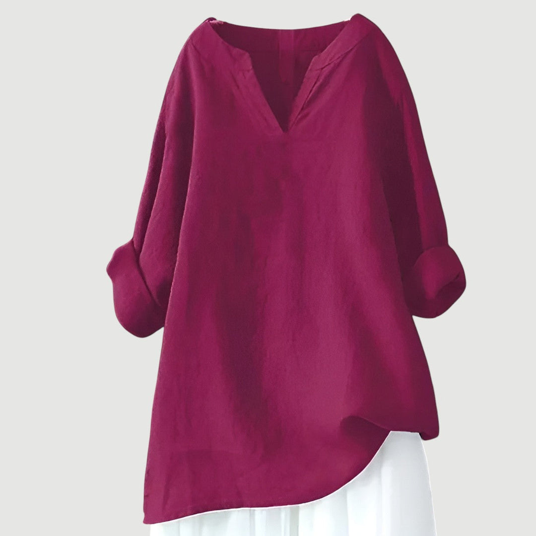 Hip-length women's airy shirt, designed for a relaxed, comfortable fit. Ideal breathable summer top for casual wear.