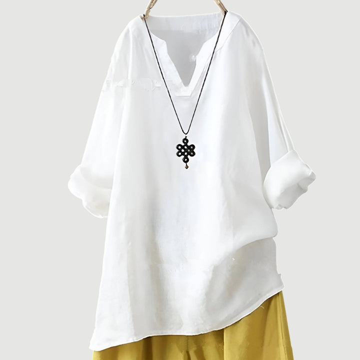 Relaxed fit women's airy shirt, a hip-length summer top offering breathable comfort for everyday casual wear.