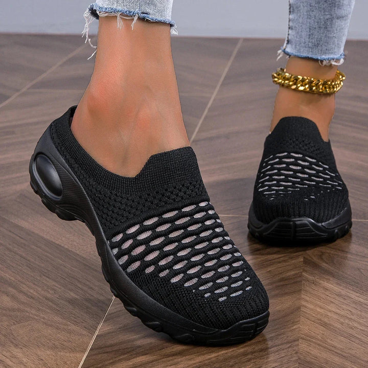 Pink women's lightweight slip-on walking shoes, breathable and comfortable for daily activities.