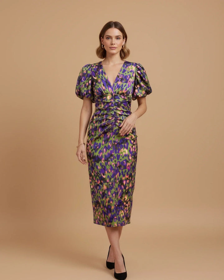 Fashionable women's midi party dress with animal print, elegant V-neckline, and stylish puff sleeves.