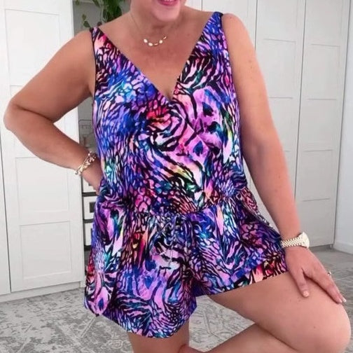 Effortless women's animal print V-neck playsuit with short sleeves, a stylish casual summer one-piece.