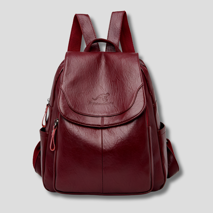 Detailed view of the embossed pattern on a women's anti-theft leather backpack.