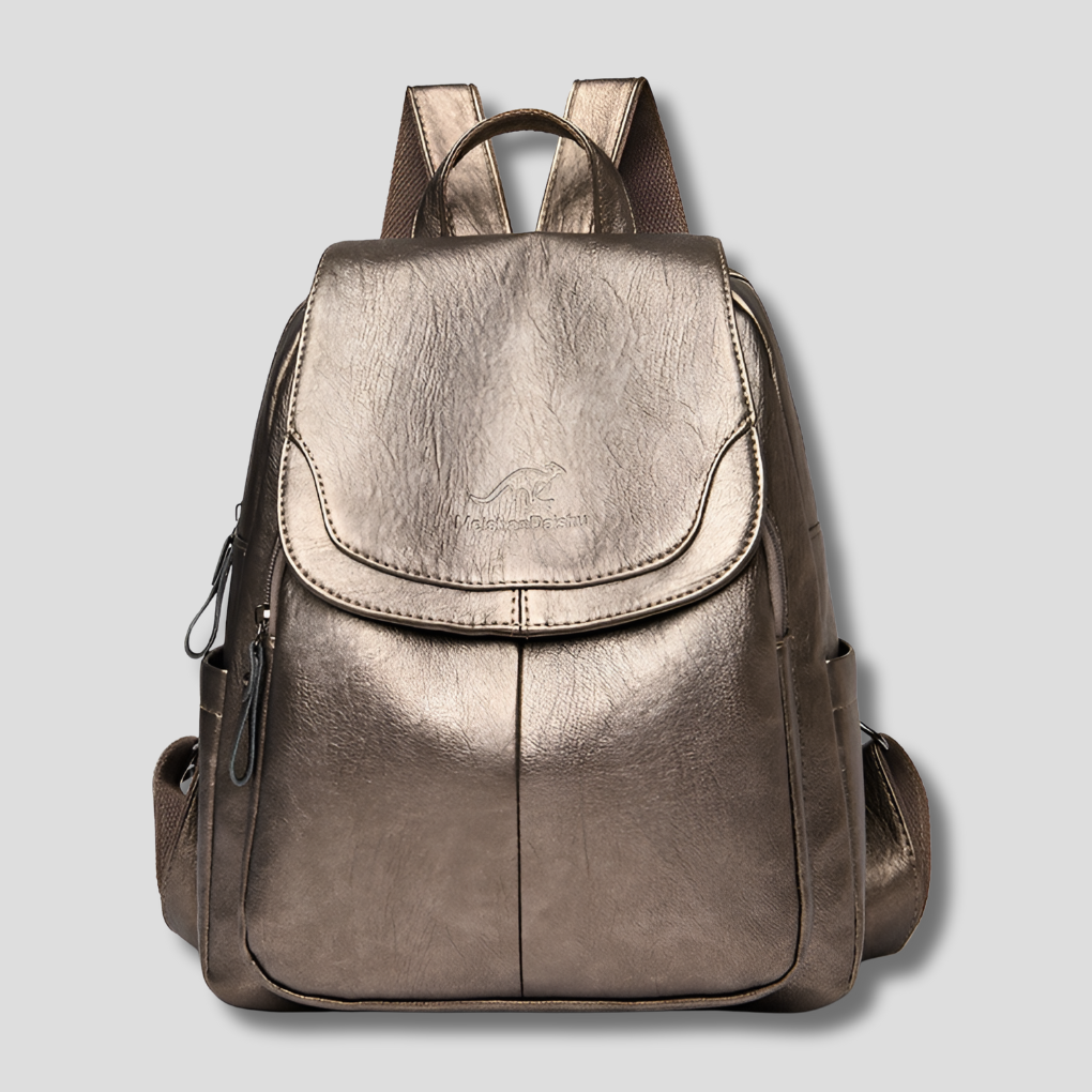 Side profile of the women's embossed leather backpack, highlighting its stylish design.