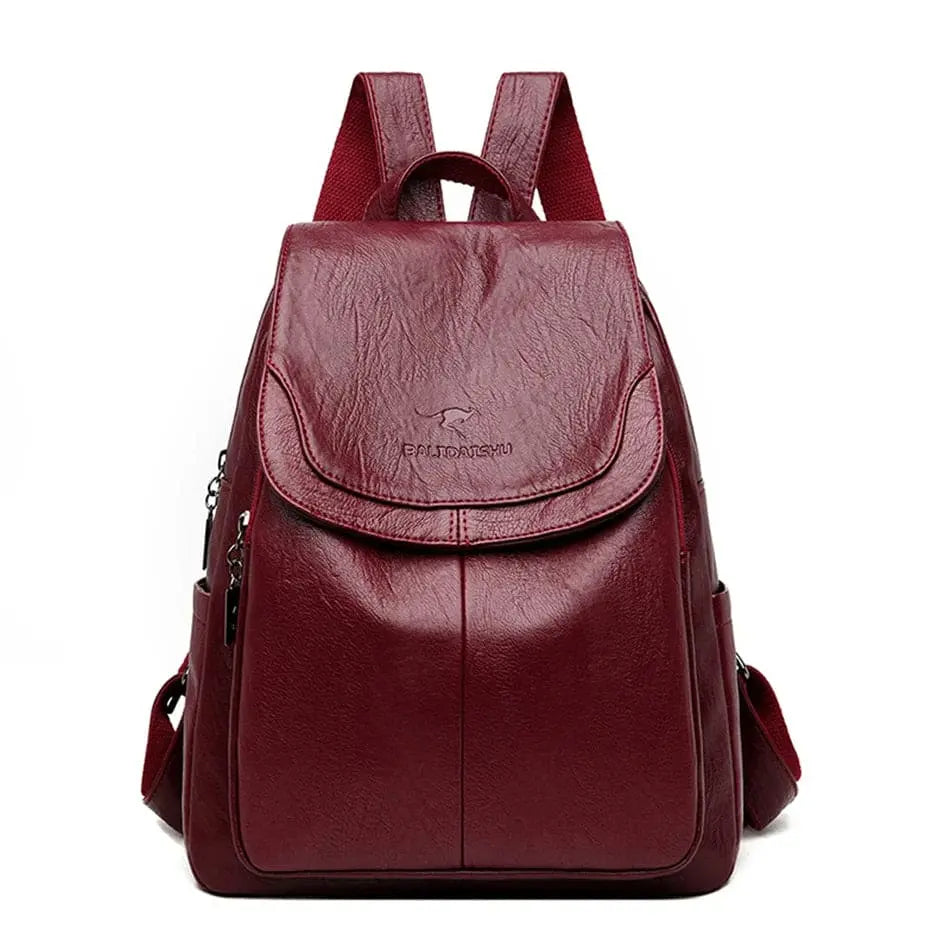 Compact anti-theft women's leather backpack, perfect for daily essentials, travel, and style.