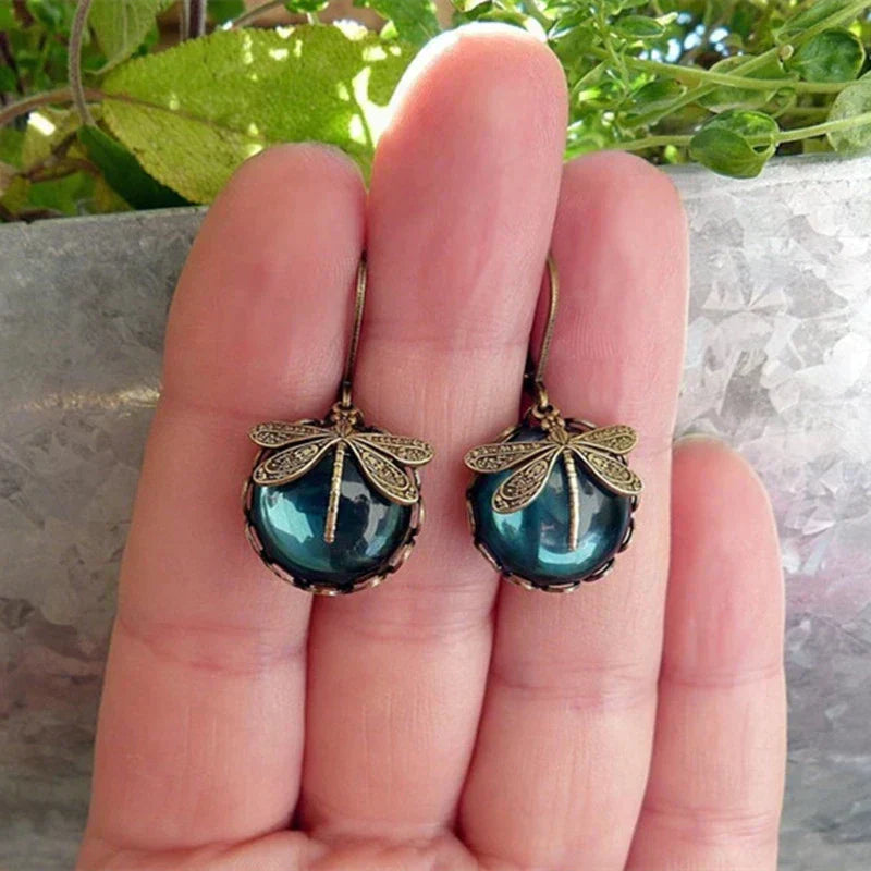 Unique crystal dragonfly earrings for women, featuring a stunning antique design and elegant sparkle.