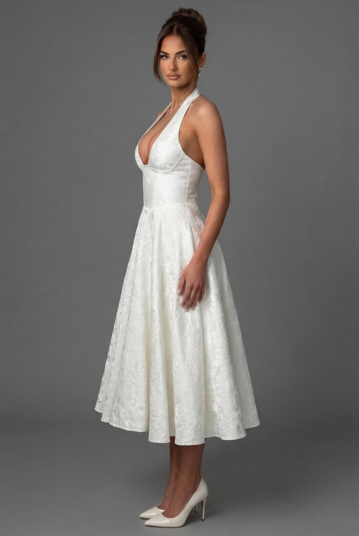 Elegant halterneck midi dress with a flattering corset bodice and ascot bow tie.